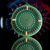 The Golden Aspis six-layer gold radionics pendant with Lakhovsky-style antenna geometry