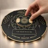 A hand positioning the Trinity Wish Coin on the Trinity Resonance Plate